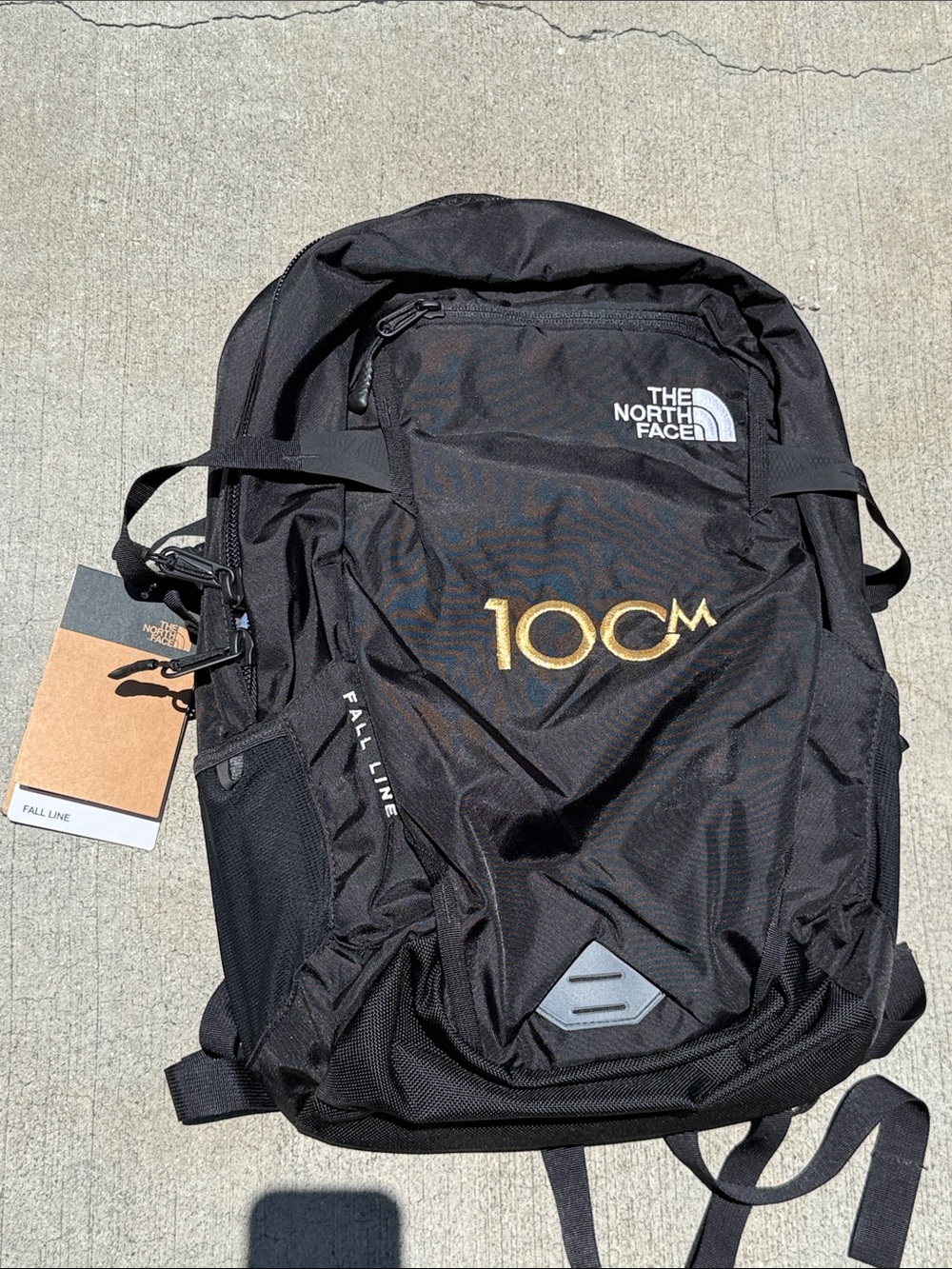 The North Face Black Fall Line 100M Backpack with Gold Logo